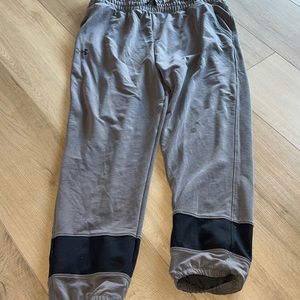 grey and black under armor sweats